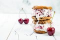 Homemade Black Forest roasted cherry ice cream sandwiches with chocolate chip cookies. Royalty Free Stock Photo