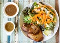 Homemade black pepper pork chop steak with salad. Royalty Free Stock Photo