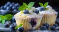 Homemade blueberry muffins on defocused background, ideal for easy recipe concept in kitchen