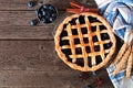 Homemade blueberry pie, top view table scene over a rustic wood background Royalty Free Stock Photo