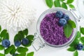 Homemade blueberry sugar scrub/bath salts/foot soak in a glass jar. DIY cosmetics for natural skin care. Copy space. Royalty Free Stock Photo