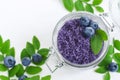 Homemade blueberry sugar scrub/bath salts/foot soak in a glass jar. DIY cosmetics for natural skin care. Royalty Free Stock Photo