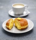 Homemade Bomboloni filled with custard Royalty Free Stock Photo