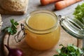 Homemade bone broth in a glass jar