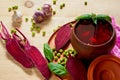 Homemade borscht with vegetables on the wooden background decorated with fresh sliced beet, garlic, basil leaves and green peas Royalty Free Stock Photo