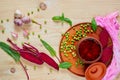 Homemade borscht with vegetables on the wooden background decorated with fresh sliced beet, garlic and green peas Royalty Free Stock Photo
