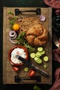 Homemade bread loaf and fresh ingredients for making vegetarian Royalty Free Stock Photo