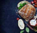 Homemade bread loaf and vegetables Royalty Free Stock Photo