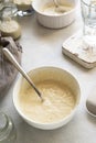 Homemade breadmaking with sourdough using wild yeast, busy lifestyle scene of baking at home, top view. Sustainable living