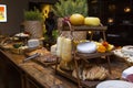 Homemade breads and assorted cheeses exposed on the wooden table Royalty Free Stock Photo