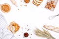 Homemade breads or bun, croissant and bakery ingredients, flour, almond nuts, hazelnuts, eggs on white background, Bakery Royalty Free Stock Photo