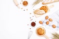 Homemade breads or bun, croissant and bakery ingredients, flour, almond nuts, hazelnuts, eggs on white background, Bakery Royalty Free Stock Photo