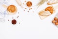 Homemade breads or bun, croissant and bakery ingredients, flour, almond nuts, hazelnuts, eggs on white background, Bakery Royalty Free Stock Photo