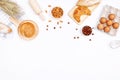 Homemade breads or bun, croissant and bakery ingredients, flour, almond nuts, hazelnuts, eggs on white background, Bakery Royalty Free Stock Photo