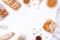 Homemade breads or bun, croissant and bakery ingredients, flour, almond nuts, hazelnuts, eggs on white background, Bakery Royalty Free Stock Photo