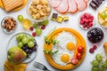 Homemade breakfast with sunny side up fried egg toast coffee fruits vegetable and orange juice in top view with copy space. Delici Royalty Free Stock Photo