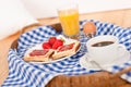 Homemade breakfast on wicker tray