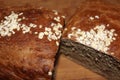 Homemade brown wholemeal bread with oats on top