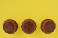 Homemade brownie brownies on yellow background. Delicious chocolate brownie cakes. Close up.