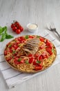 Homemade Bruschetta Chicken Pasta on a Plate, side view Royalty Free Stock Photo