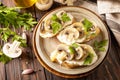 Homemade bruschetta with mushrooms. Toasted sandwich from baguettes bread with soft cheese and grilled mushrooms on wooden rustic Royalty Free Stock Photo