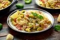 Homemade Brussels sprouts, bacon, pancetta pasta with parmesan cheese. On wooden table Royalty Free Stock Photo