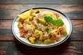 Homemade Brussels sprouts, bacon, pancetta pasta with parmesan cheese. On wooden table Royalty Free Stock Photo