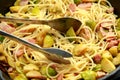 Homemade Brussels sprouts, bacon, pancetta pasta with parmesan cheese. On wooden table Royalty Free Stock Photo