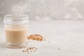 Homemade buckwheat milk in glass. Healthy vegan dairy-free alter