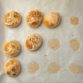 Homemade burger bun on bakery parchment . Food photography, concept of homemade fresh bakery. Rolls with sesame seeds hamburger