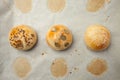 Homemade burger bun on bakery parchment . Food photography, concept of homemade fresh bakery. Rolls with sesame seeds hamburger Royalty Free Stock Photo