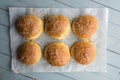 Homemade burger bun on parchment Royalty Free Stock Photo