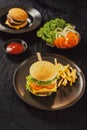 Homemade burger and cheese with fries and icy soft drink Royalty Free Stock Photo