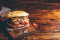 Homemade Burger on Cutting Board. Royalty Free Stock Photo