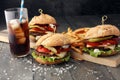 Homemade burger with fries and icy soft drink. Royalty Free Stock Photo