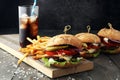 Homemade burger with fries and icy soft drink. Royalty Free Stock Photo