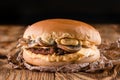 homemade burger with mushrooms in rustic style on wooden background Royalty Free Stock Photo