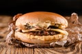 homemade burger with mushrooms in rustic style on wooden background Royalty Free Stock Photo