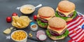 Homemade burgers. An American classic, traditional food for picnic or celebration Independence Day Royalty Free Stock Photo