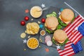 Homemade burgers. An American classic, traditional food for picnic or celebration Independence Day Royalty Free Stock Photo