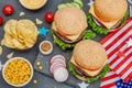 Homemade burgers. An American classic, traditional food for picnic or celebration Independence Day Royalty Free Stock Photo