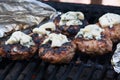 Homemade burgers on the BBQ Royalty Free Stock Photo