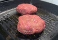 Homemade burgers cooking