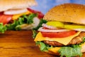 Homemade burgers on wooden background. Close up Royalty Free Stock Photo
