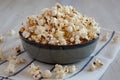 Homemade Buttered Popcorn with Salt in a Bowl, side view. Close-up