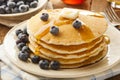 Homemade Buttermilk Pancakes with Blueberries and Syrup