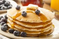 Homemade Buttermilk Pancakes with Blueberries and Syrup