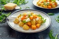 Homemade Butternut squash gnocchi with wild rocket and parmesan, ricotta cheese Royalty Free Stock Photo