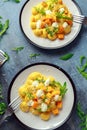 Homemade Butternut squash gnocchi with wild rocket and parmesan, ricotta cheese