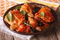 Homemade Cacciatori chicken on a plate close-up. horizontal